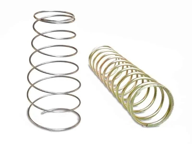 Two different helical springs. John Evans’ manufactures helical springs of almost all types and sizes, including compression, extension, and torsion springs, using wire with the diameter as small as .004 inches.