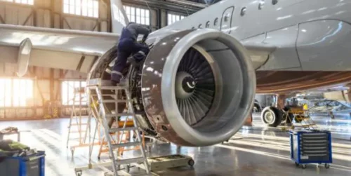 Man working on large plane propeller inside of hanger. With years of experience and outstanding service, John Evans’ Sons is a world class manufacturing partner for the aerospace industry.
